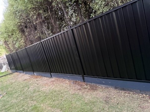 Colorbond boundary fence installed along a boundary